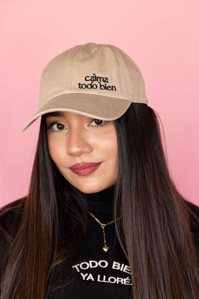 Khaki dad hat with black embroidered phrase